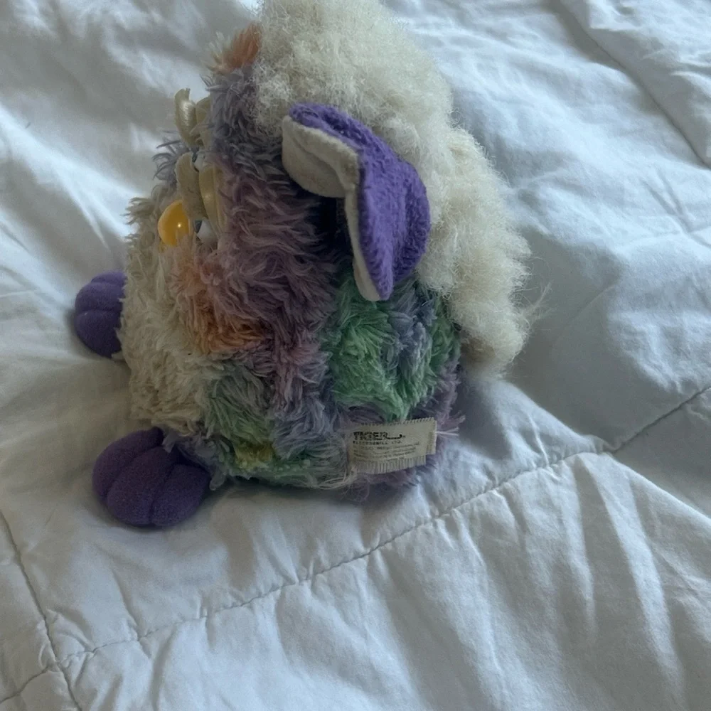 Colorful Plush Bird Toy with Purple Accents